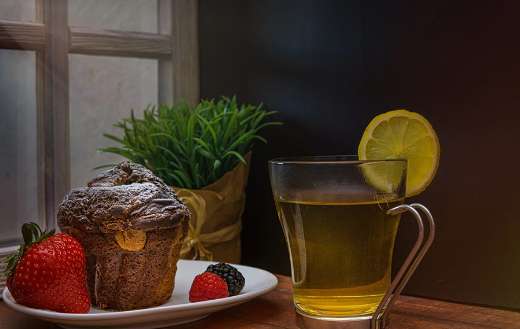Still life cake lemon tea