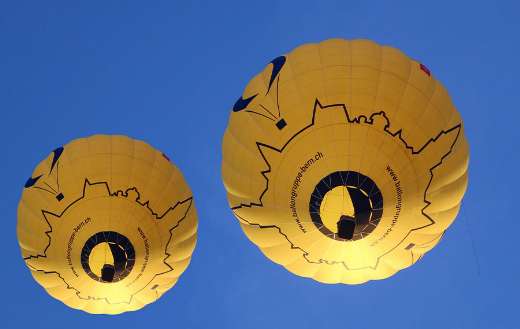 Ballooning two yellow balloon