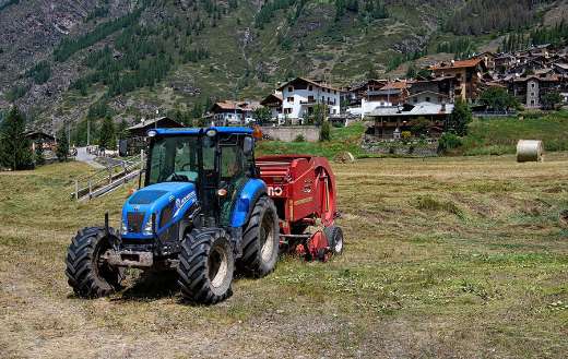 Haymaking tedder tractor