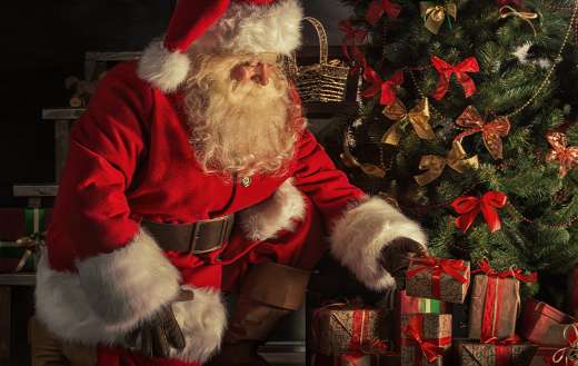 Santa putting gift online