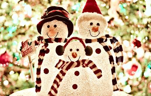 Three white snowman decorations