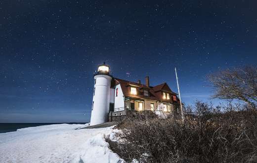 Light house starry sky white snow