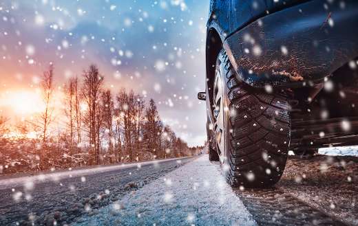 Car tires on winter road online