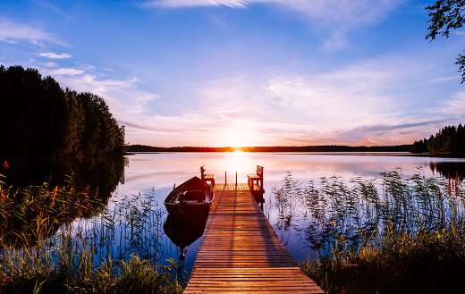 Wooden pier with fishing boat