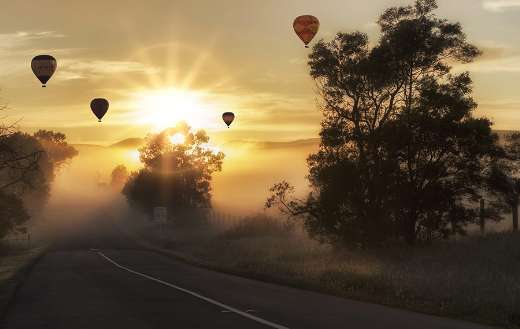 Hot air balloons morning road