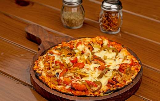 Pizza in wooden tray