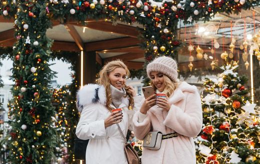 Two women near christmas decorations