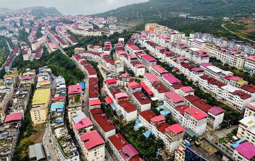 City building houses red roof