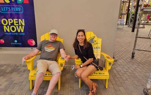 Couple in yellow chair