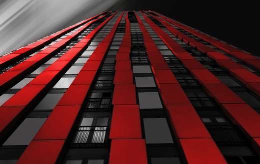 Skyscraper red apple city center Rotterdam wijnhaven harbour