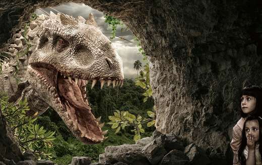 Children cave dinosaur looking
