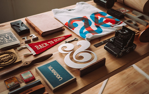 Wooden desk with camera on top free online jigsaw puzzle.