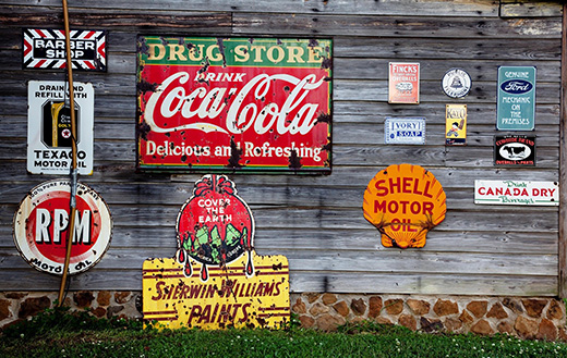 wooden-wall-with-advertising-signs
