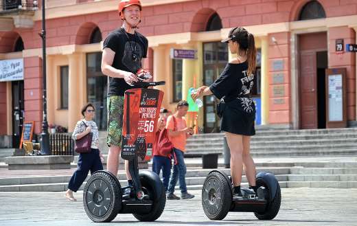 Electric vehicles young tourists people