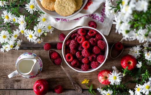 Summer raspberries ripe harvest in bowl