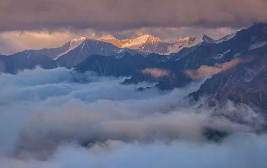 The Caucasus Russia mountain fog sunset clouds