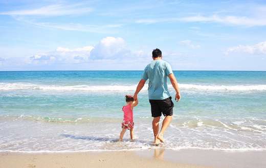 Father daughter family beach vacation