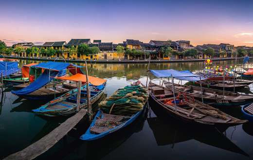 Port river boats building trees and houses