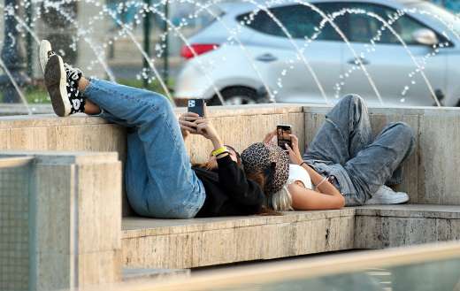 Young girls relaxation with phones