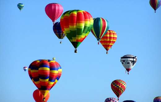 Red green hot air balloon during daytime puzzle