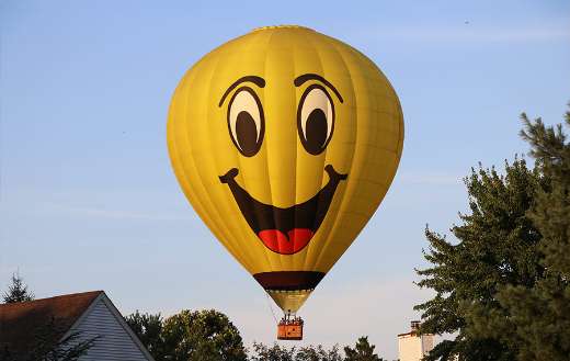 Yellow hot air balloons on air