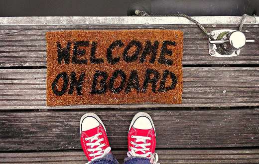 Dock with welcome on board doormat