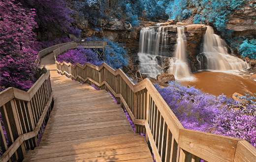 Gray stair down to black water falls