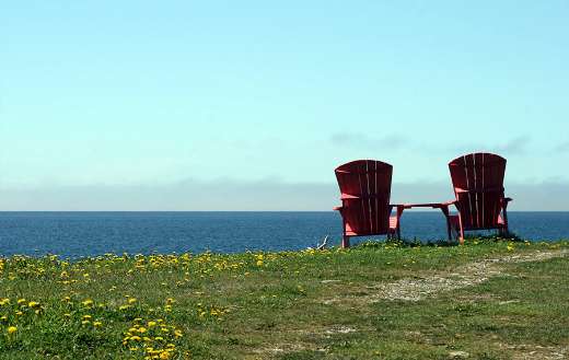 Ocean view with two red chair