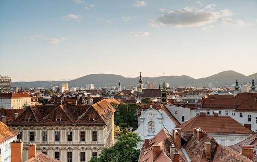 Austria Graz City buildings skyline mountain