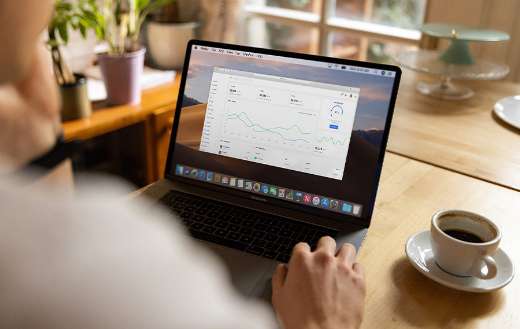 Freelancer laptop chart coffee online