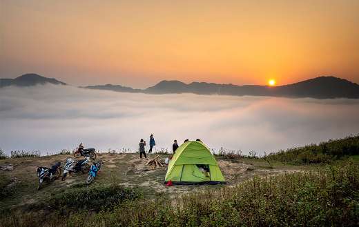 Camping tent overlooking sea of clouds