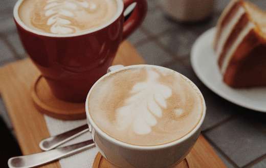 Cups of coffee on top of brown traypuzzle