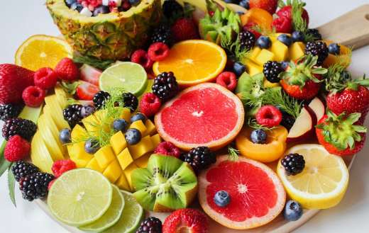 Sliced fruits on tray online