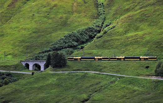 Train railway mountain bridge Jungfrau Alpine