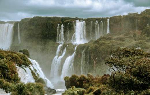 Water falls under cloudy sky online
