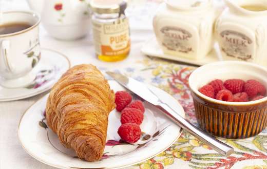 Breakfast croissant bread and raspberry