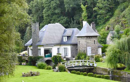 Old mill house dwelling bridge river