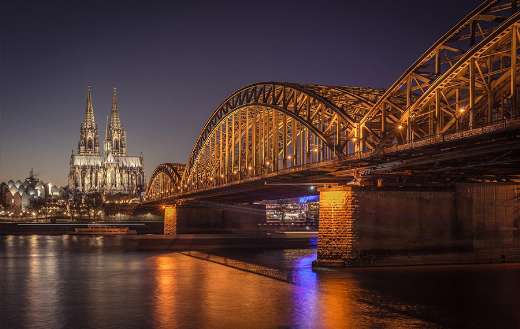 Cologne cathedral bridge night river