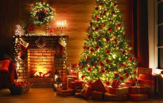 Red christmas tree decoration gift with fire place