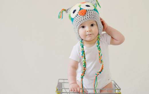 Toddler standing on basket