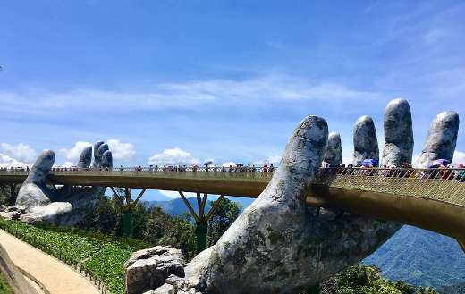 Golden bridge lifted two giant hands Danang Vietnam