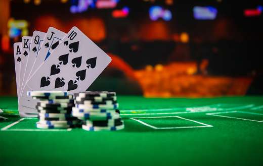 Cards and chips green felt casino table