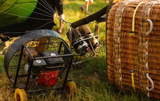 Hot air balloon basket on grass