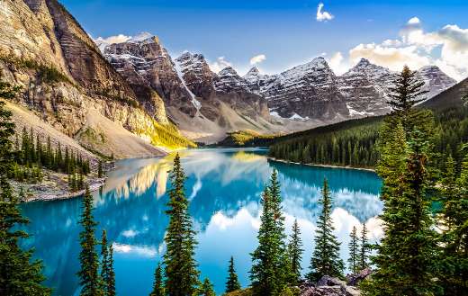 Landscape sunset view of moran lake and mountain range