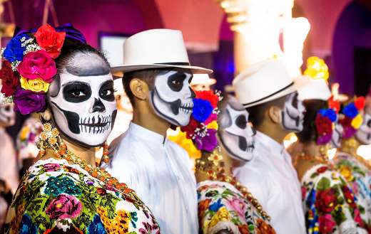 Merida Mexico performers catrina skulls make up