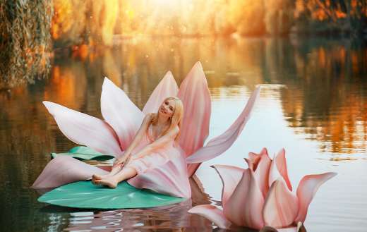 Little fairy princess in pink lotus