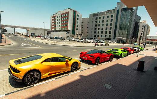Super cars parked on the street
