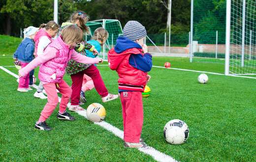 Toddler playing soccer puzzle