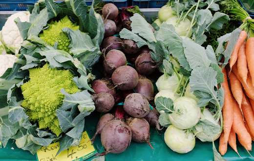 Assorted fresh ripe vegetables market stall