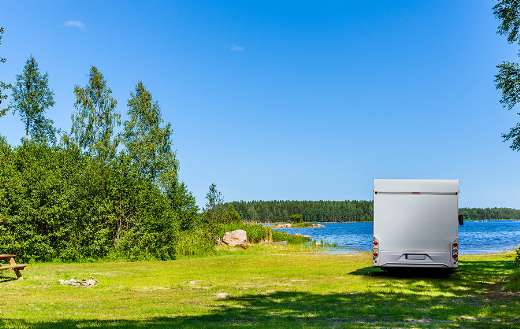 Camper by the river online